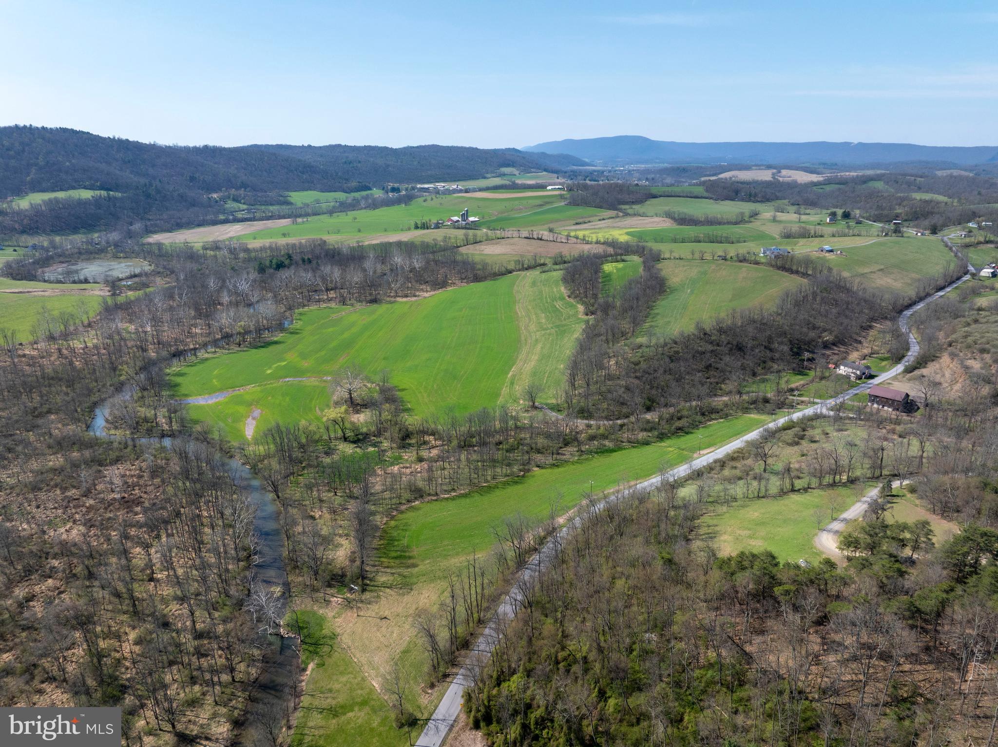 5859 Bethel Road Alexandria, PA 16611 - Photo 101 of 126 a view of a lake with a mountain in the background