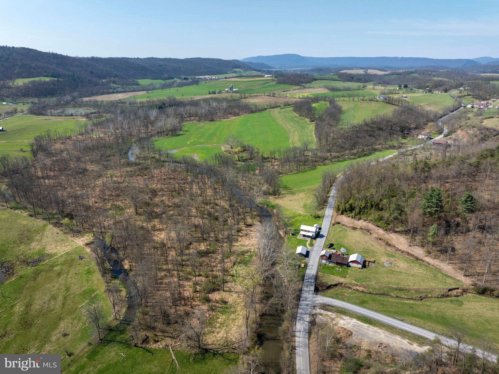 5859 Bethel Road Alexandria, PA 16611 - Photo 100 of 126 a view of a lush green hillside and houses