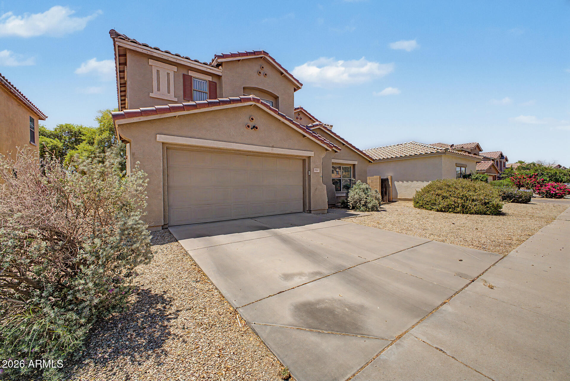 2607 West Bloch Road Phoenix, AZ 85041 - Photo 2 of 34 front view of a house with a yard