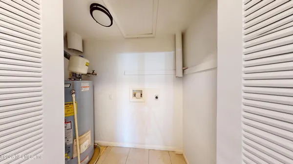 a view of a bathroom from the hallway