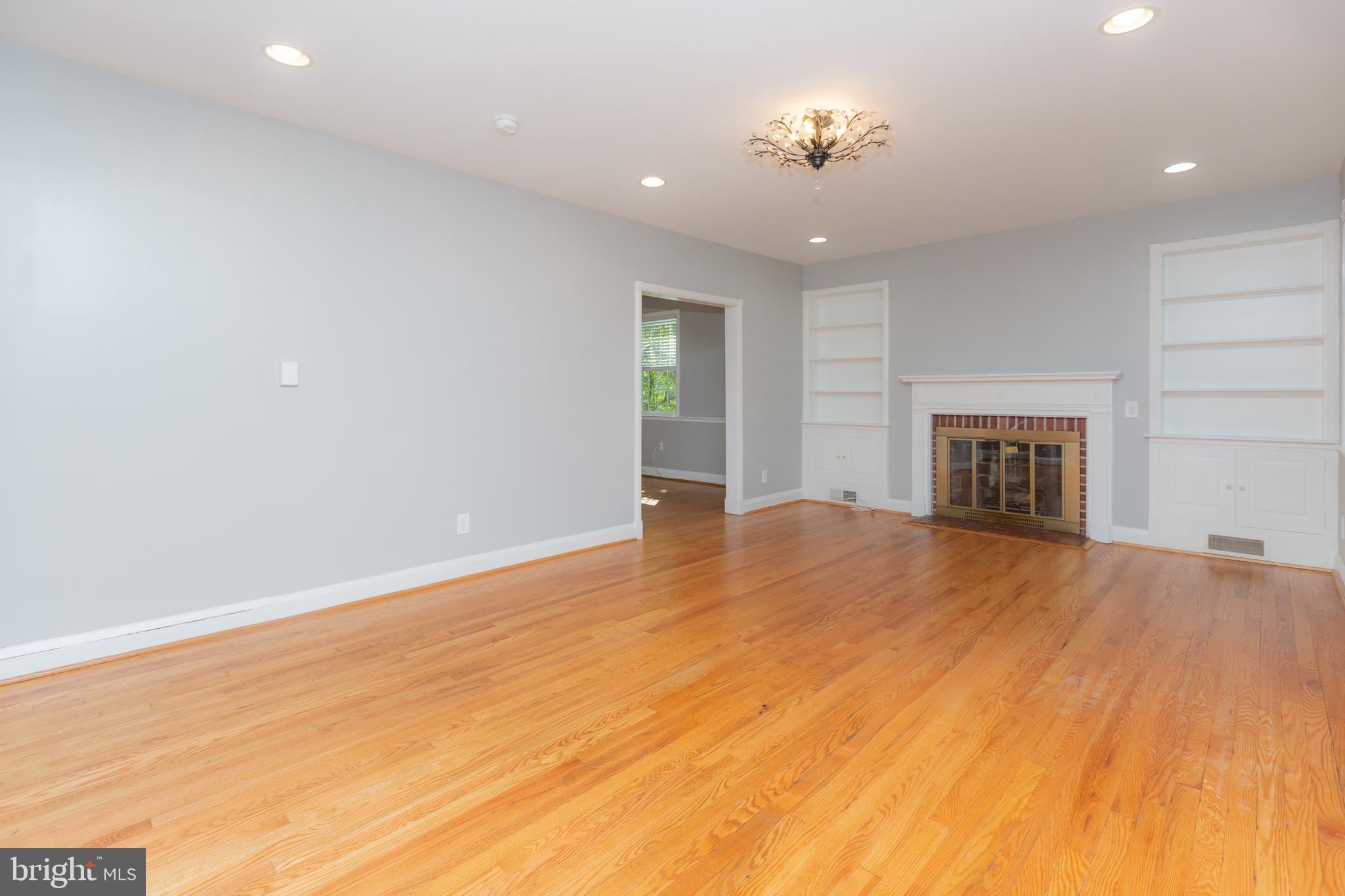 4023 Deepwood Road Baltimore, MD 21218 - Photo 3 of 42 Living room with fireplace