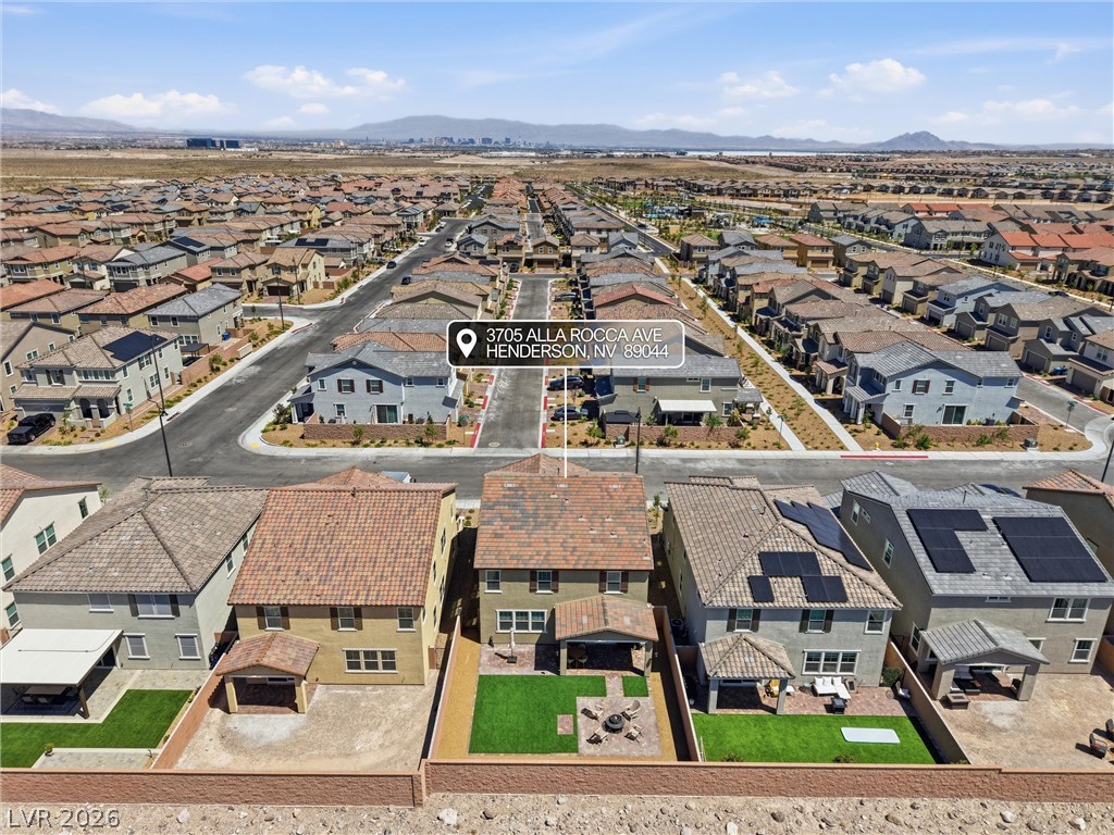 3705 Alla Rocca Avenue Henderson, NV 89044 - Photo 41 of 50 This elevated view showcases a serene residential community under a bright sky.