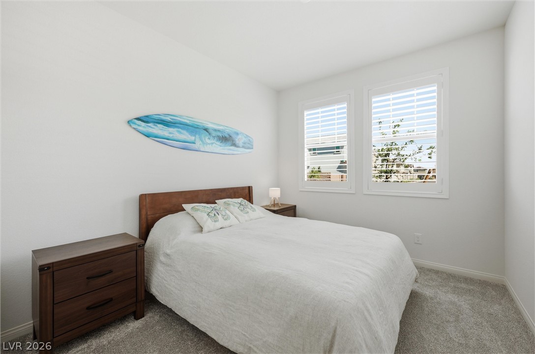 3705 Alla Rocca Avenue Henderson, NV 89044 - Photo 6 of 50 This tranquil #2 room Downstairs: offers soft lighting and ample space for rest and relaxation.