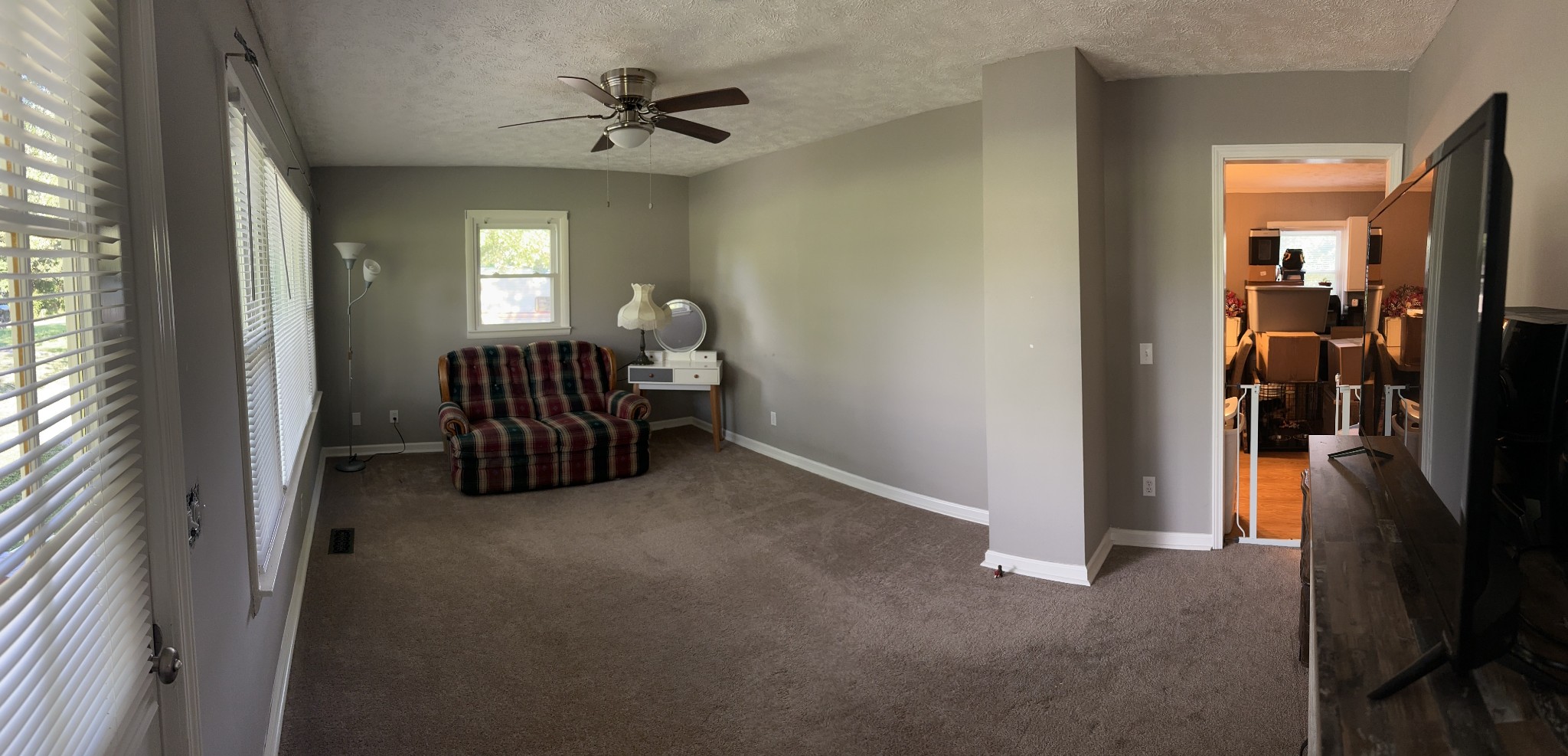 247 Petty Gap Road Woodbury, TN 37190 - Photo 11 of 23 a view of a livingroom with a couch and a ceiling fan