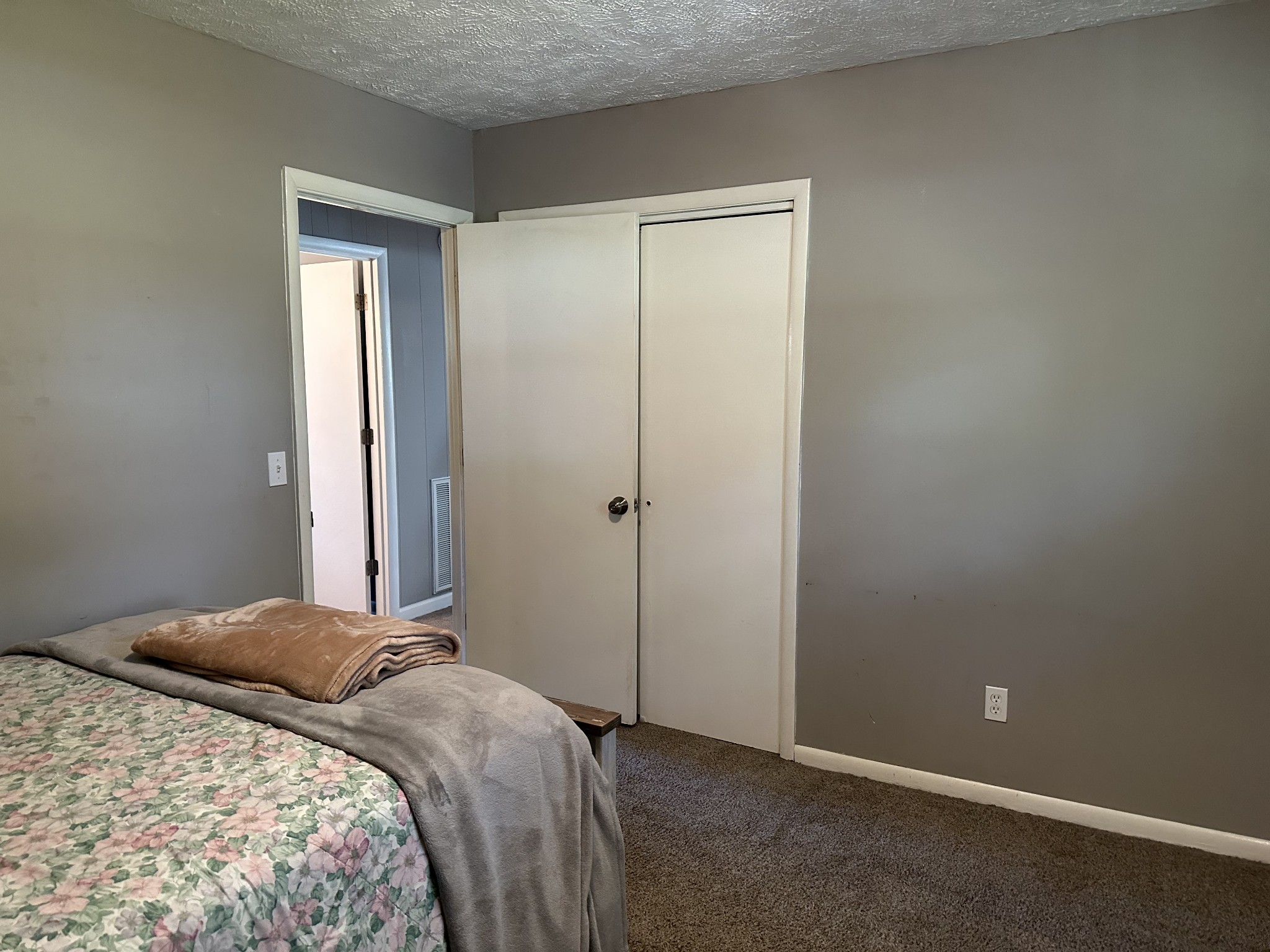 247 Petty Gap Road Woodbury, TN 37190 - Photo 15 of 23 a bedroom with a bed and a window