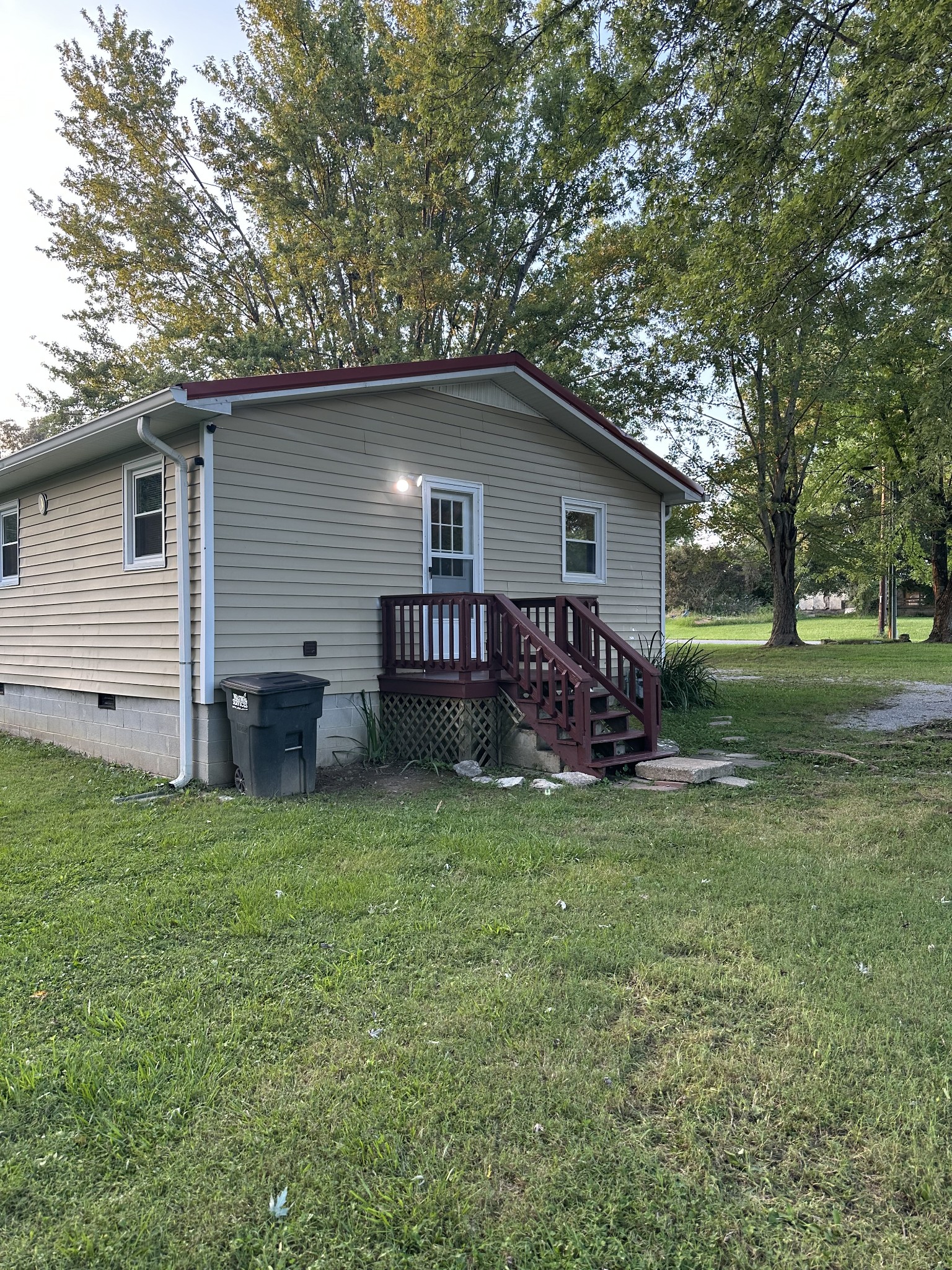 247 Petty Gap Road Woodbury, TN 37190 - Photo 3 of 23 a view of a house with a yard