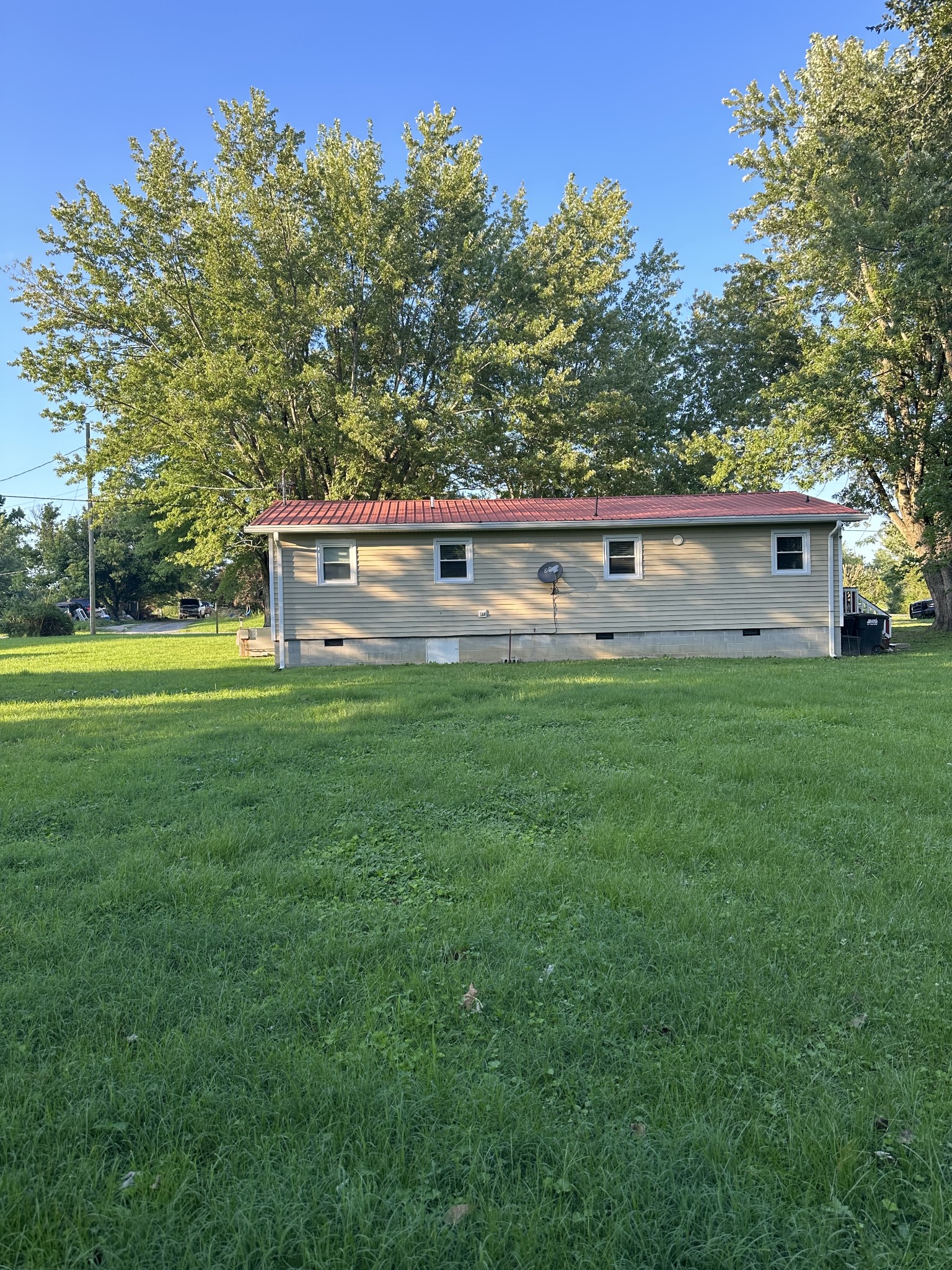 247 Petty Gap Road Woodbury, TN 37190 - Photo 4 of 23 a view of a house with a backyard