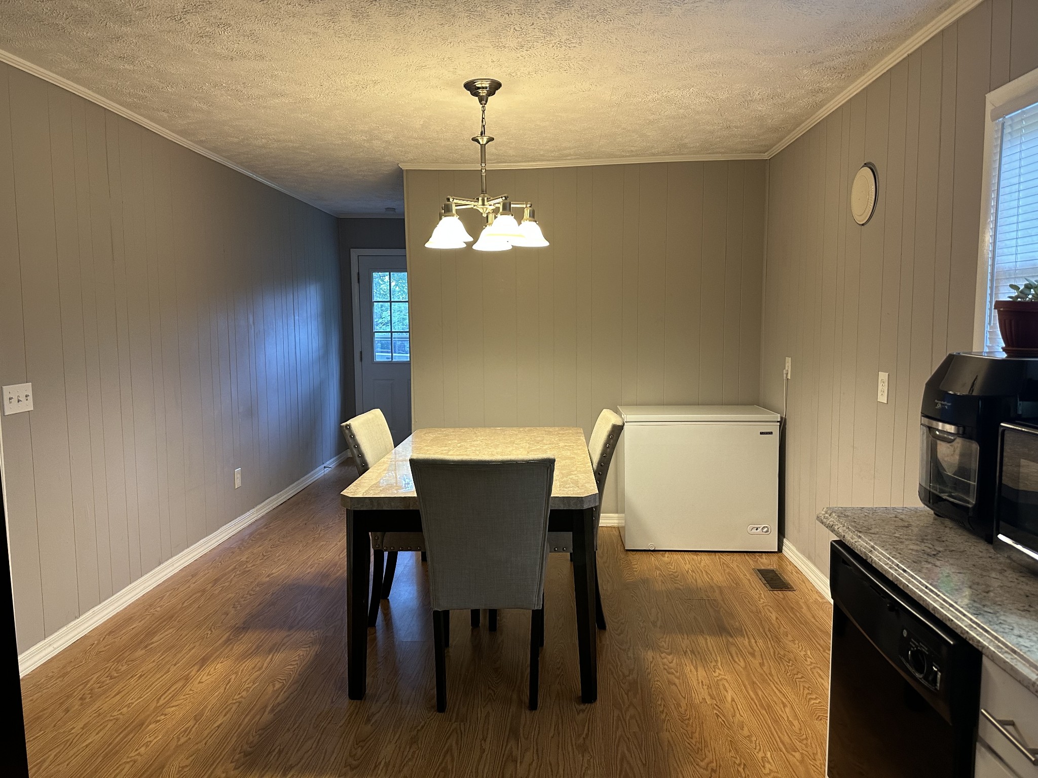247 Petty Gap Road Woodbury, TN 37190 - Photo 6 of 23 a view of a dining room with furniture and wooden floor