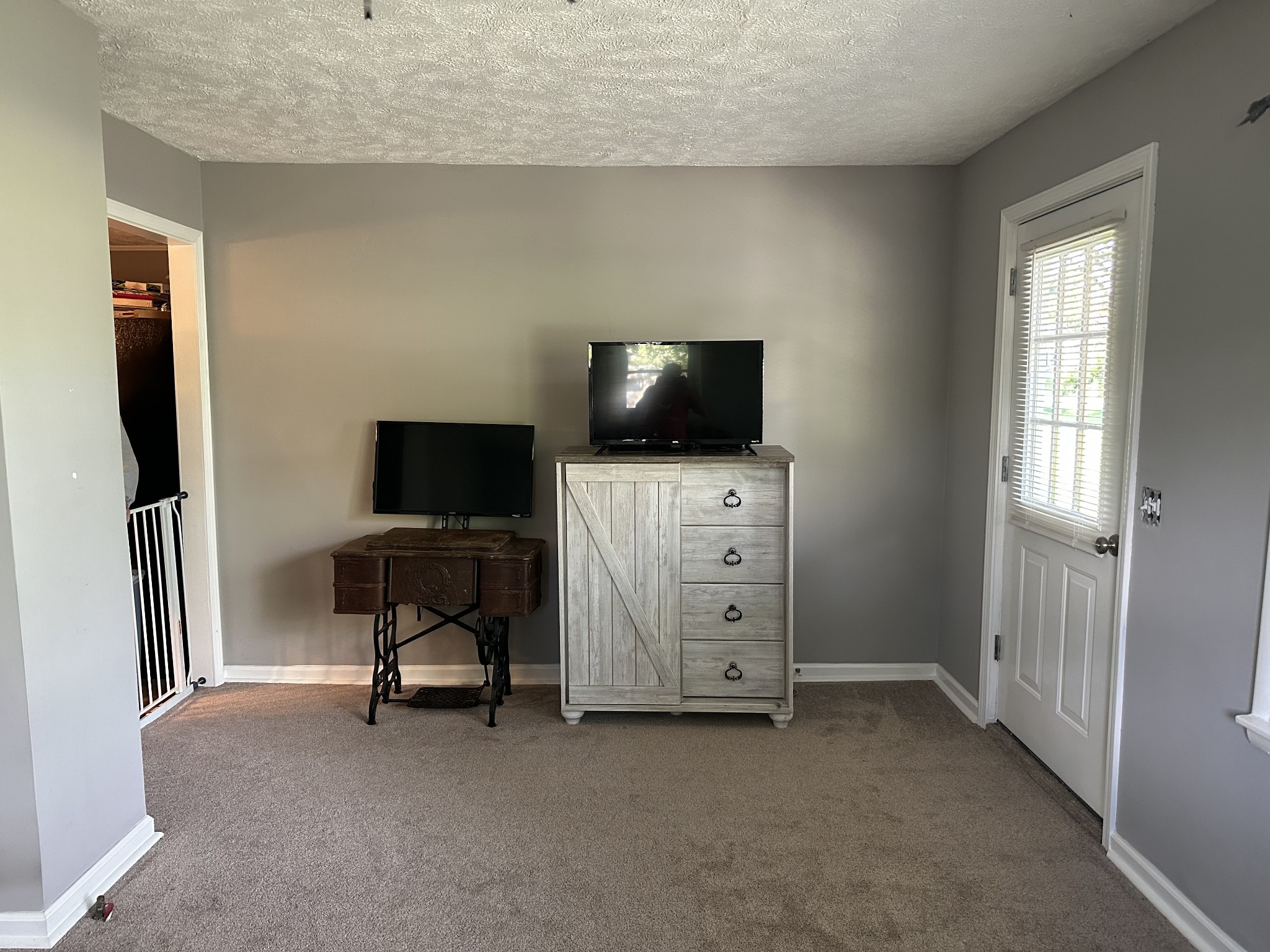 247 Petty Gap Road Woodbury, TN 37190 - Photo 9 of 23 a view of work space with furniture and a flat screen tv