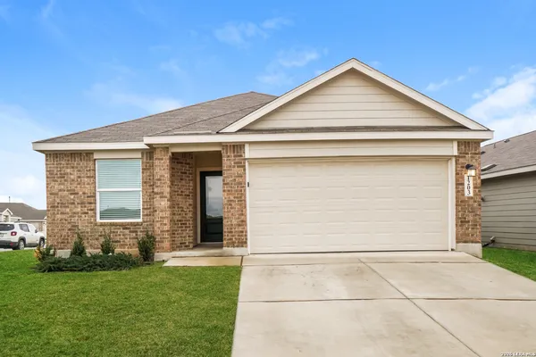 a front view of house with yard