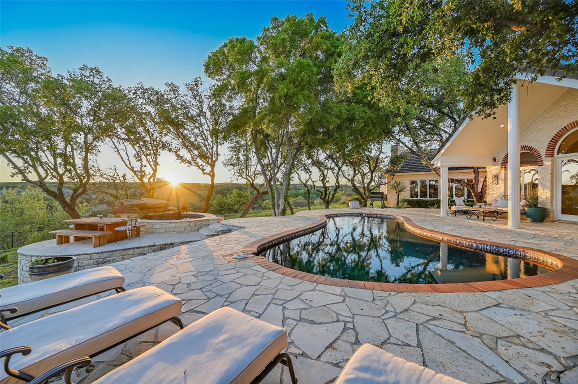 Experience Hill Country living at its finesta harmonious blend of natural splendor, refined elegance, and warm community spirit awaits at this exquisite Spicewood retreat.
