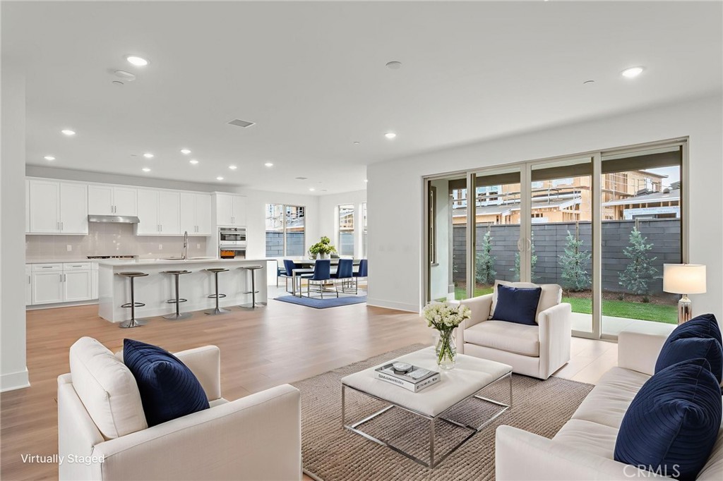 5208 Solace Drive Rancho Mission Viejo, CA 92694 - Photo 24 of 27 a living room with furniture and a large window