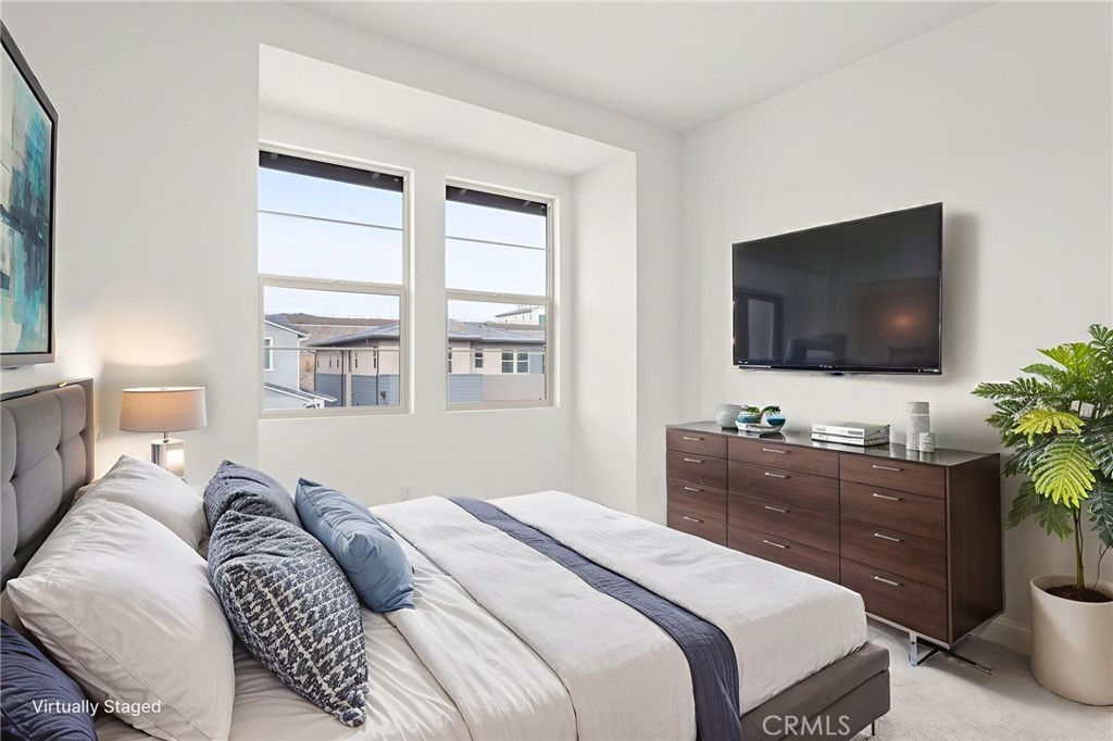 5208 Solace Drive Rancho Mission Viejo, CA 92694 - Photo 27 of 27 a bedroom with a bed and a flat screen tv