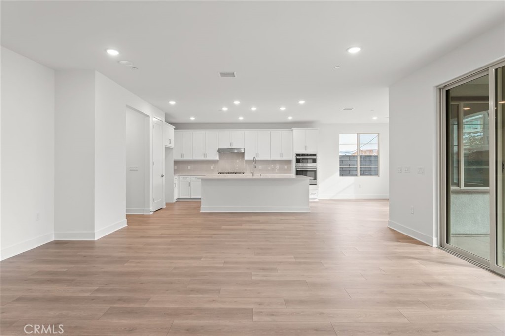 5208 Solace Drive Rancho Mission Viejo, CA 92694 - Photo 6 of 27 a view of kitchen with wooden floor