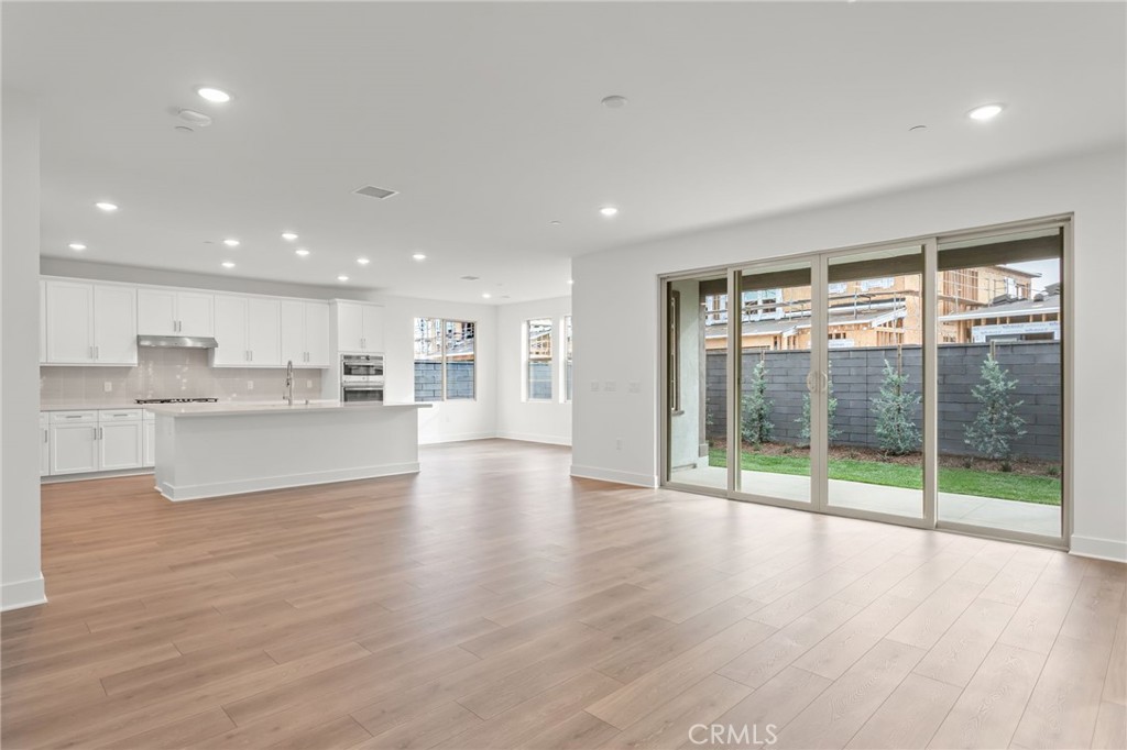 5208 Solace Drive Rancho Mission Viejo, CA 92694 - Photo 7 of 27 a view of kitchen with wooden floor