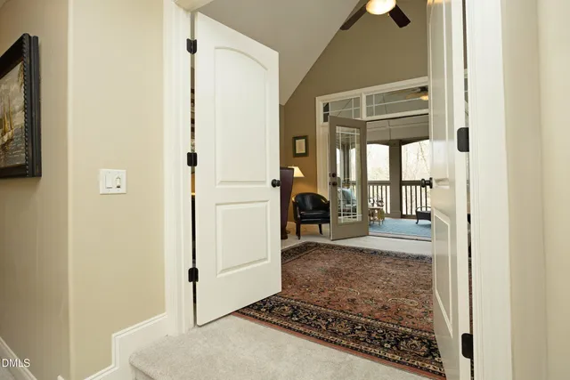 a bedroom with a bed furniture and a window