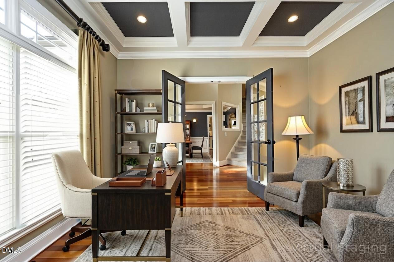 2705 Peachleaf Street Raleigh, NC 27614 - Photo 9 of 52 a living room with furniture and a large window