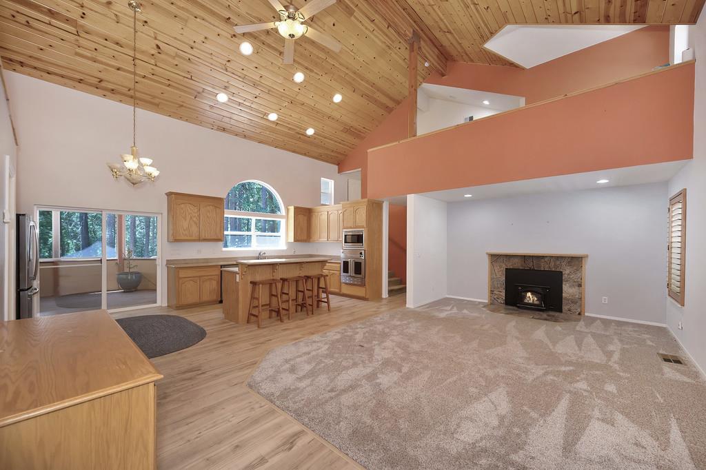 1861 Rubicon Road Georgetown, CA 95634 - Photo 11 of 68 a view of a big room with furniture and a fireplace