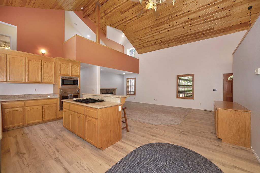 1861 Rubicon Road Georgetown, CA 95634 - Photo 19 of 68 a kitchen with stainless steel appliances granite countertop a stove and a refrigerator