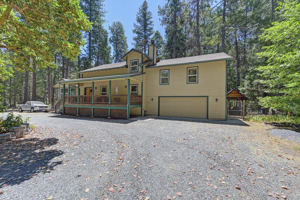 1861 Rubicon Road Georgetown, CA 95634 - Photo 2 of 68 a view of a house with a backyard and balcony