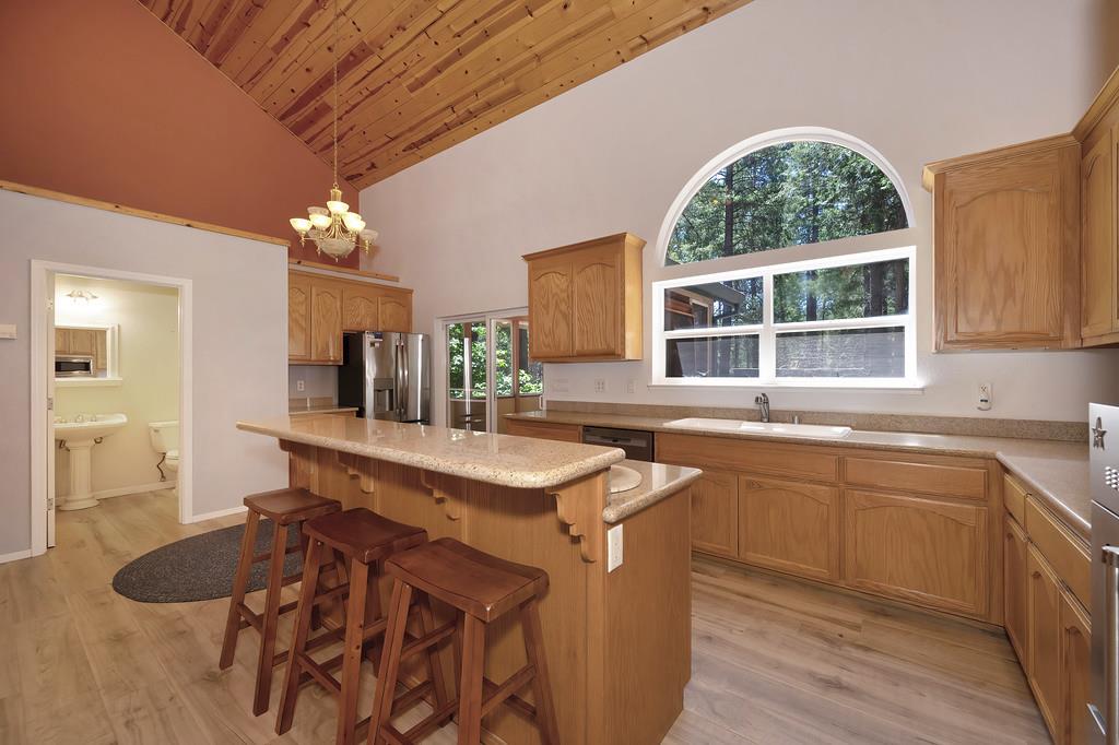 1861 Rubicon Road Georgetown, CA 95634 - Photo 22 of 68 a kitchen with a sink stove and cabinets