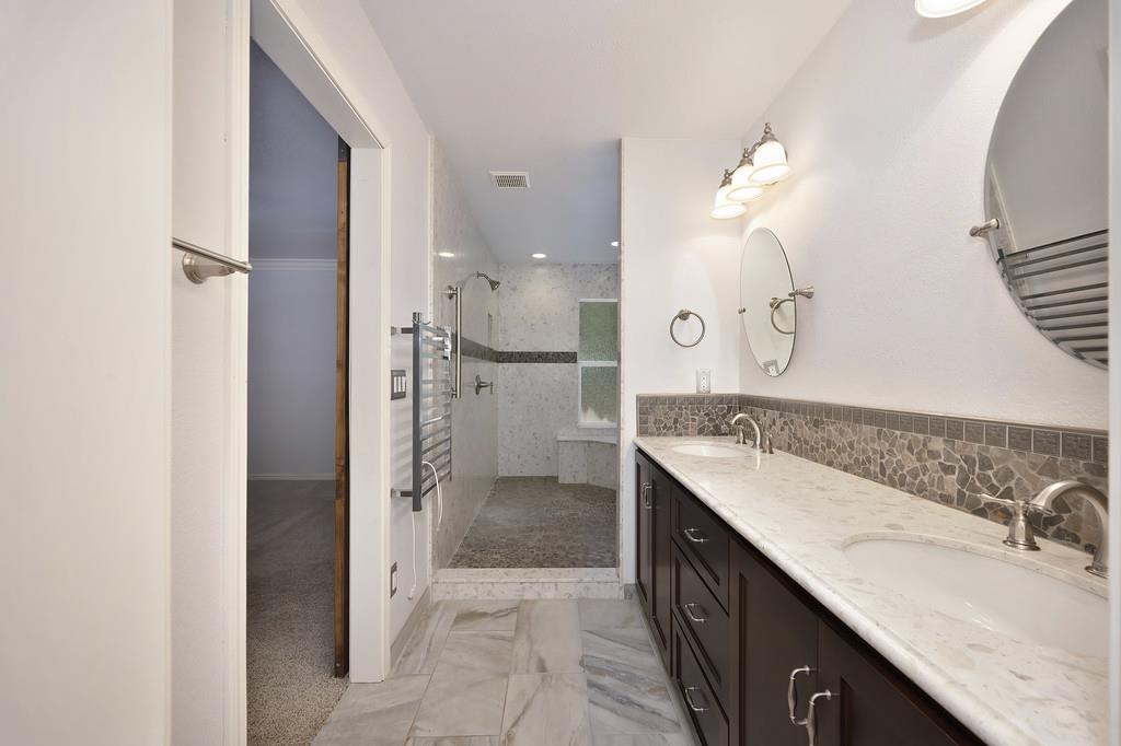 1861 Rubicon Road Georgetown, CA 95634 - Photo 31 of 68 a spacious bathroom with a double vanity sink mirror and double