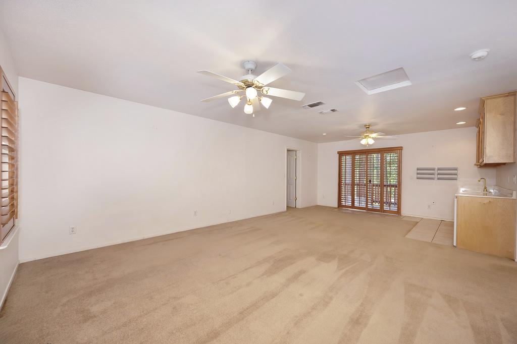 1861 Rubicon Road Georgetown, CA 95634 - Photo 37 of 68 a view of an empty room with chandelier fan and window
