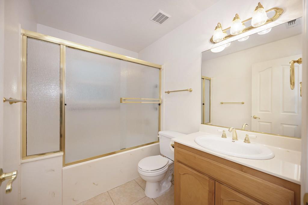1861 Rubicon Road Georgetown, CA 95634 - Photo 39 of 68 a bathroom with a sink a toilet and shower