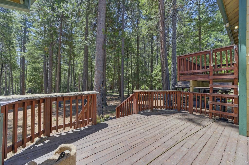 1861 Rubicon Road Georgetown, CA 95634 - Photo 45 of 68 a view of deck with wooden floor and outdoor seating