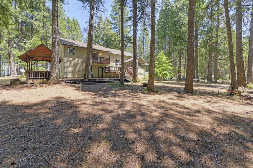 1861 Rubicon Road Georgetown, CA 95634 - Photo 60 of 68 a view of a house with backyard and trees