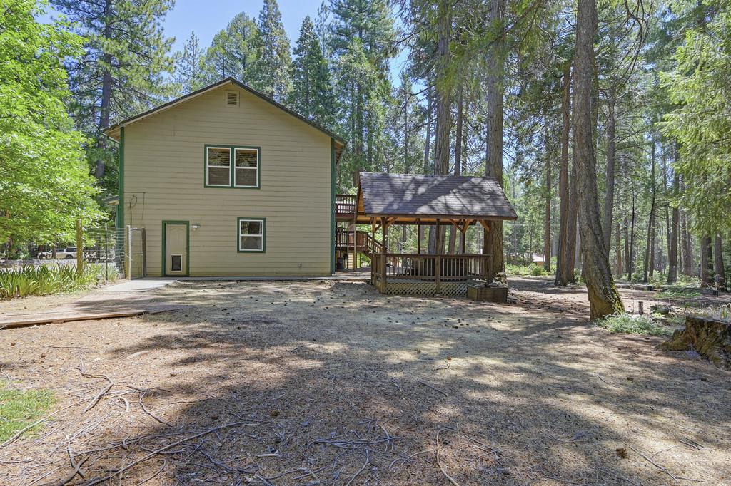 1861 Rubicon Road Georgetown, CA 95634 - Photo 64 of 68 a front view of a house with a yard and garage