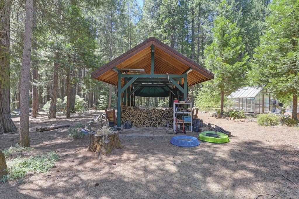 1861 Rubicon Road Georgetown, CA 95634 - Photo 66 of 68 a view of a house with backyard and tree