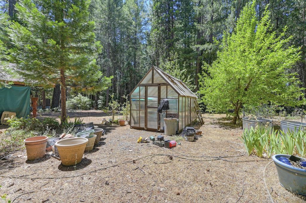 1861 Rubicon Road Georgetown, CA 95634 - Photo 68 of 68 a view of a backyard with sitting area and garden