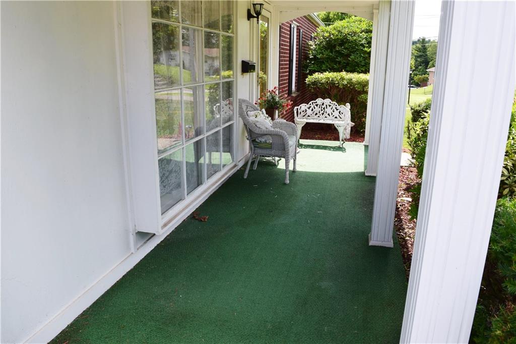 48 Old York Road Washington, PA 15301 - Photo 2 of 23 The covered front porch will surely be a favorite spot to sit and relax.