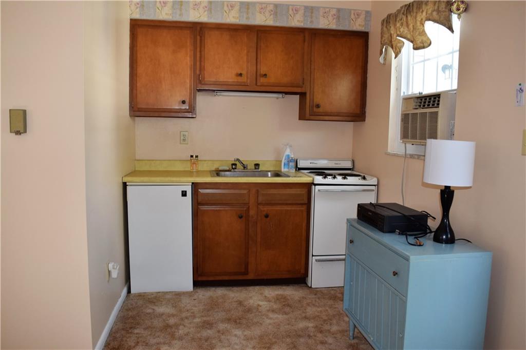 48 Old York Road Washington, PA 15301 - Photo 16 of 23 A small kitchen in the outside suite provides many of the conveniences of home.