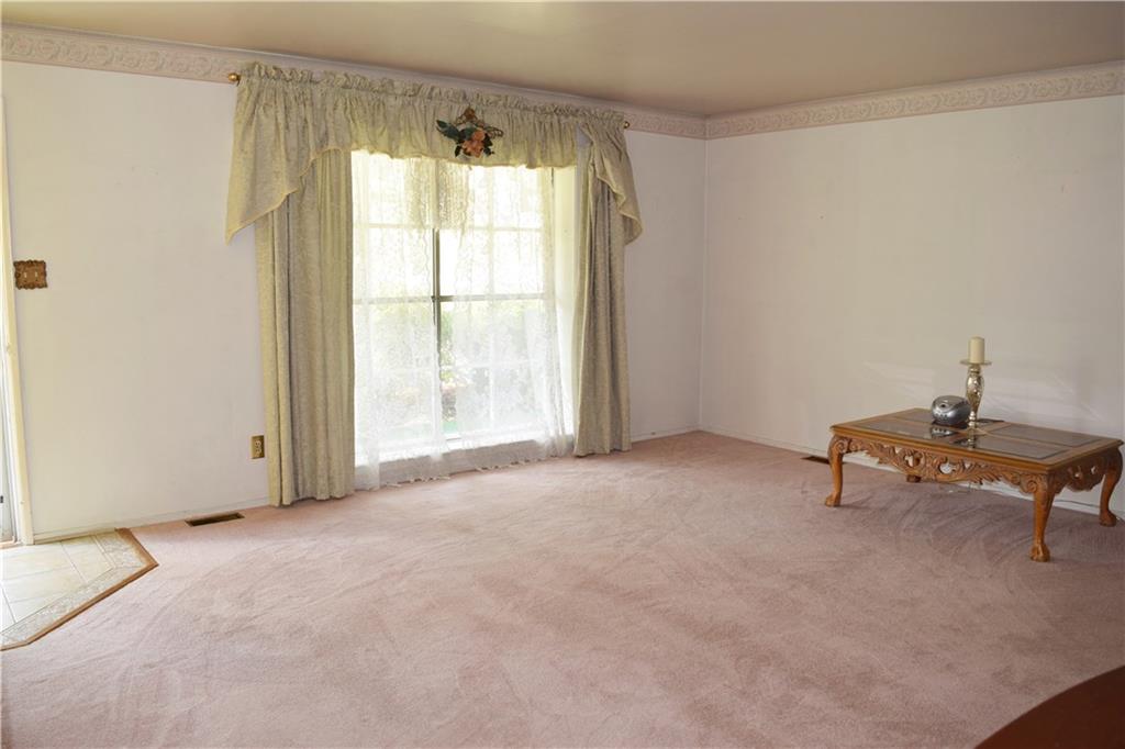 48 Old York Road Washington, PA 15301 - Photo 4 of 23 The spacious living room offers a tile entry.
