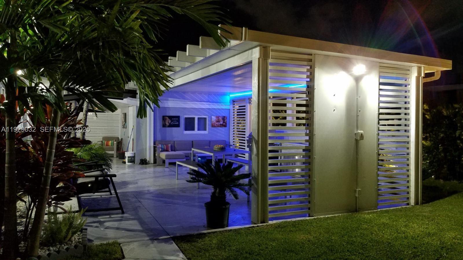 1071 West 66th Street Hialeah, FL 33012 - Photo 13 of 17 a view of outdoor space yard and porch