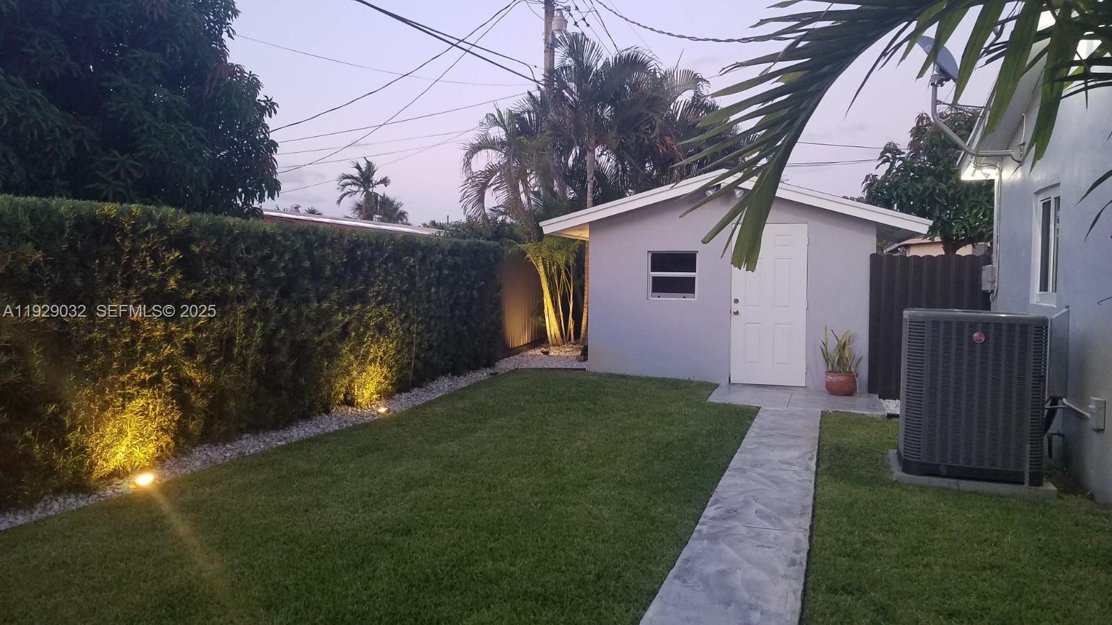 1071 West 66th Street Hialeah, FL 33012 - Photo 16 of 17 a view of a back yard of the house