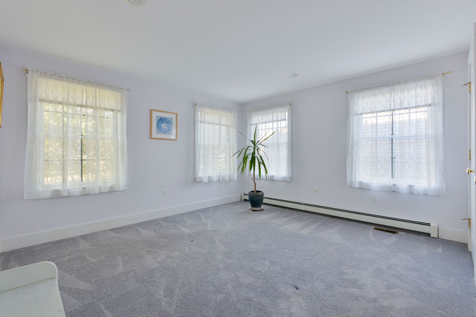 12 Appleton Road Nantucket, MA 02554 - Photo 13 of 24 an empty room with windows