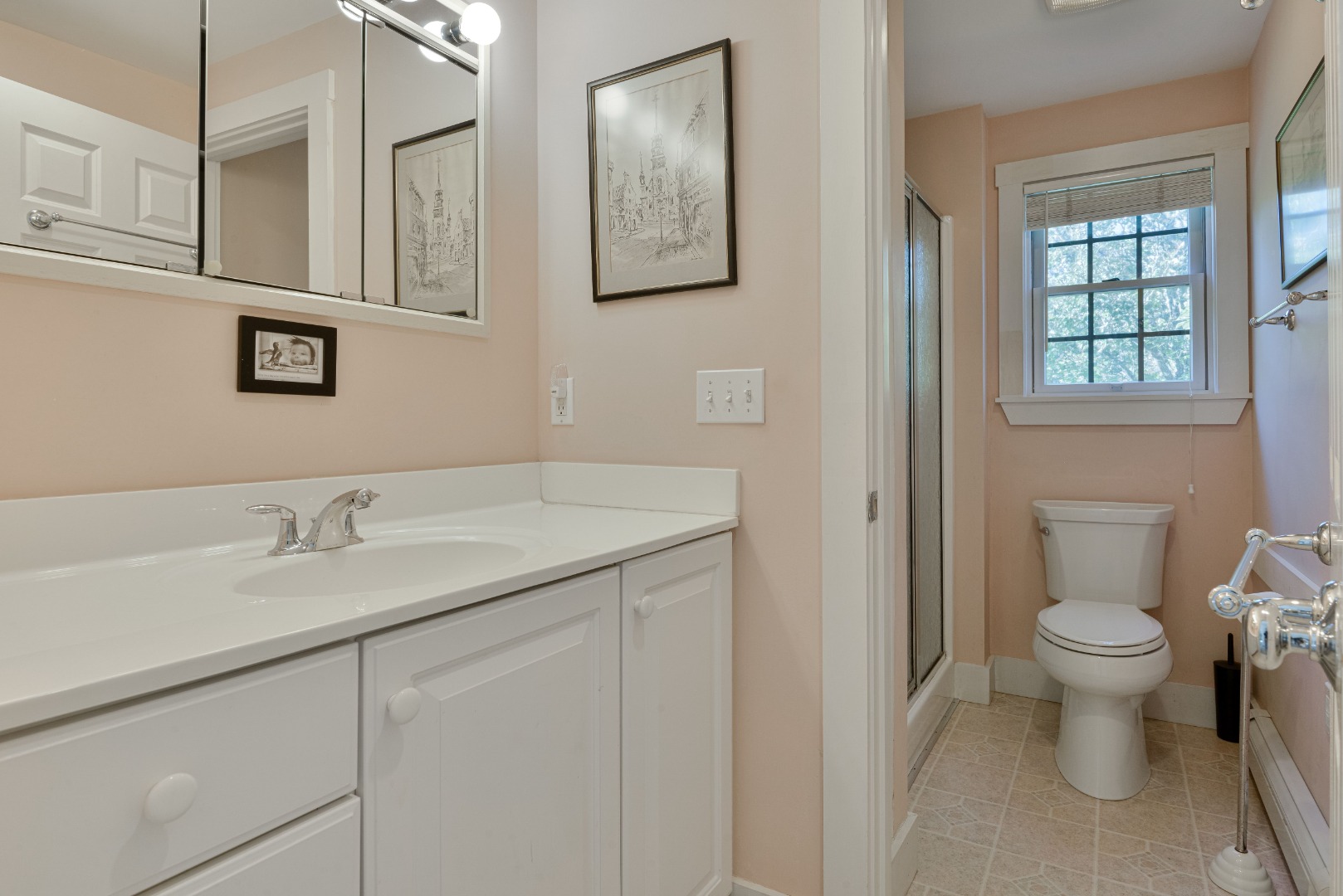 12 Appleton Road Nantucket, MA 02554 - Photo 15 of 24 a bathroom with a granite countertop sink and a toilet