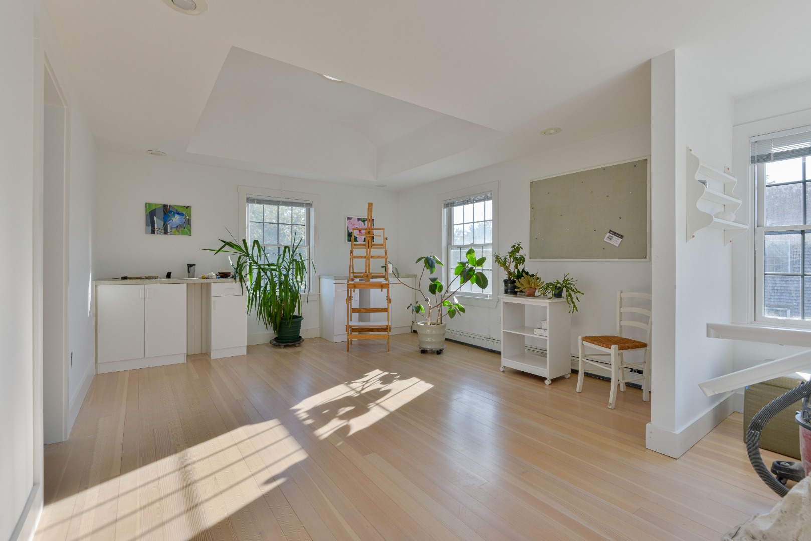 12 Appleton Road Nantucket, MA 02554 - Photo 16 of 24 a living room with furniture and a wooden floor