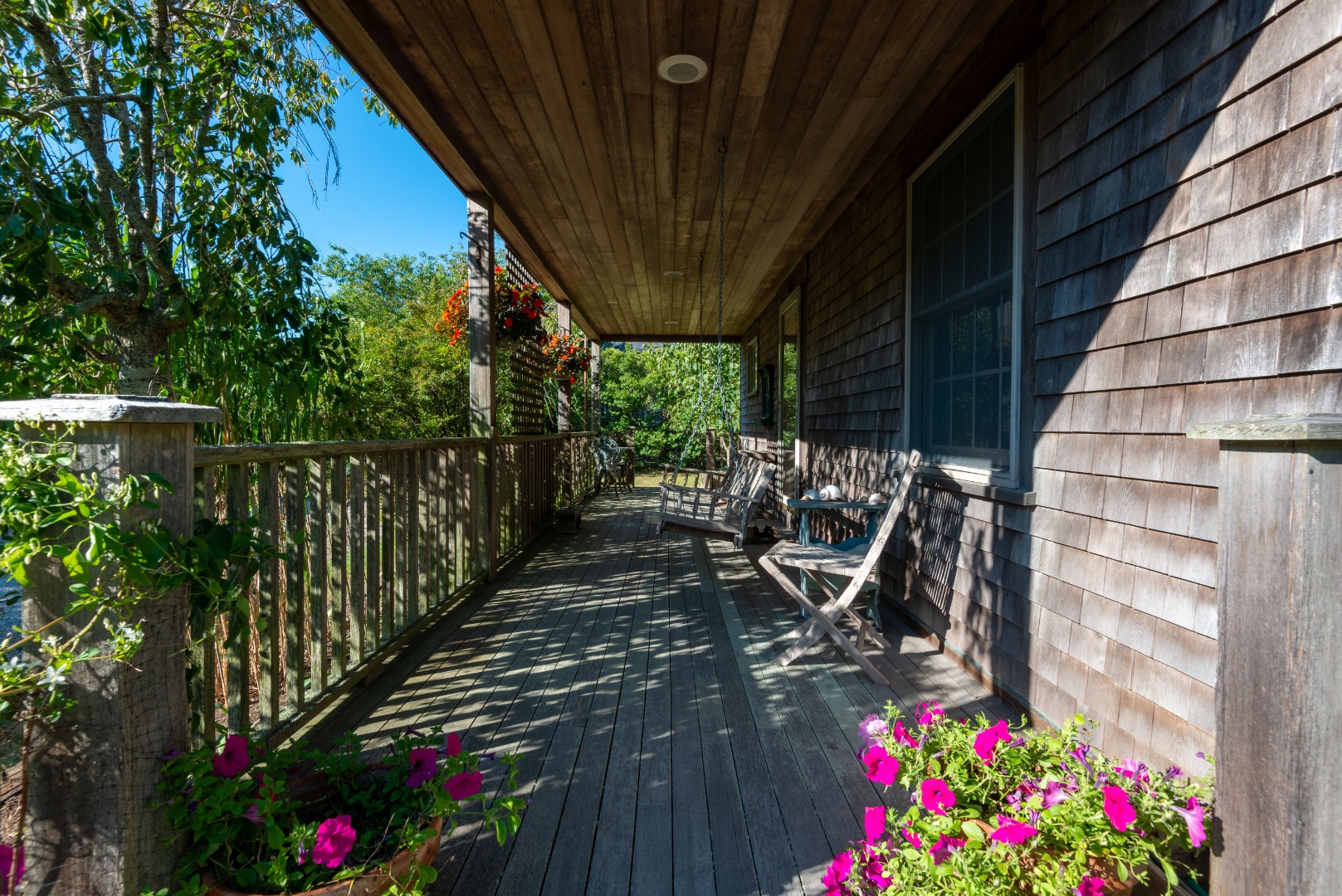 12 Appleton Road Nantucket, MA 02554 - Photo 2 of 24 a view of a balcony with outdoor seating