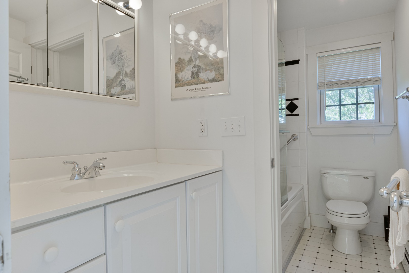 12 Appleton Road Nantucket, MA 02554 - Photo 21 of 24 a bathroom with a sink toilet and window