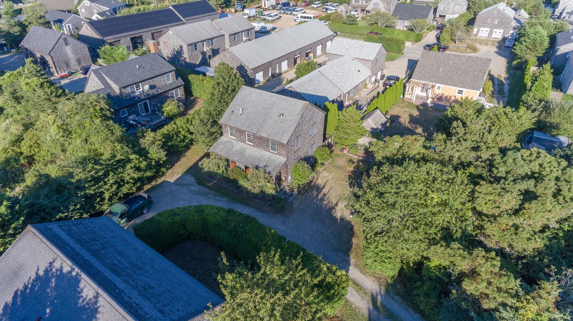 12 Appleton Road Nantucket, MA 02554 - Photo 22 of 24 an aerial view of multiple houses with yard