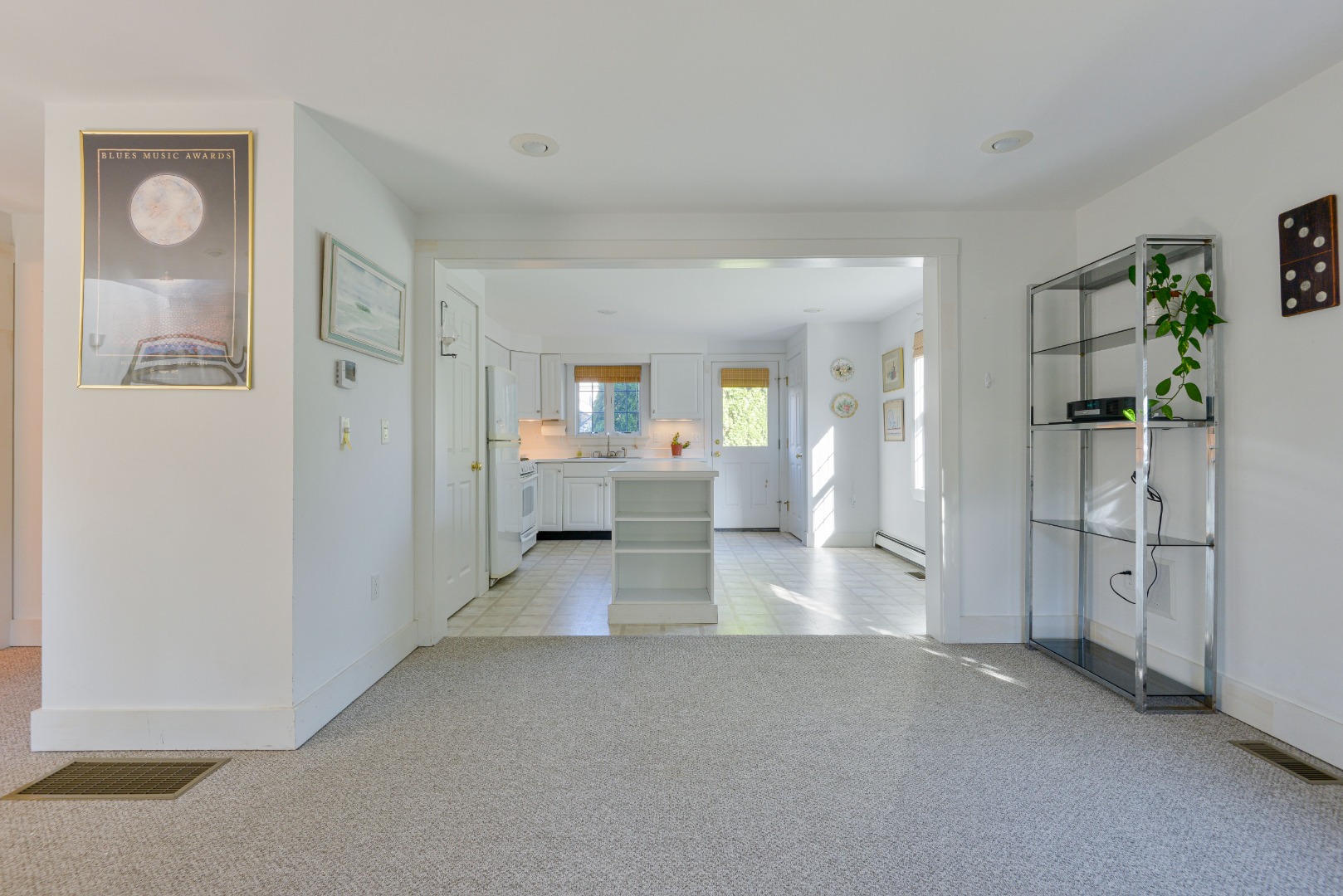 12 Appleton Road Nantucket, MA 02554 - Photo 8 of 24 a view of a room with large windows
