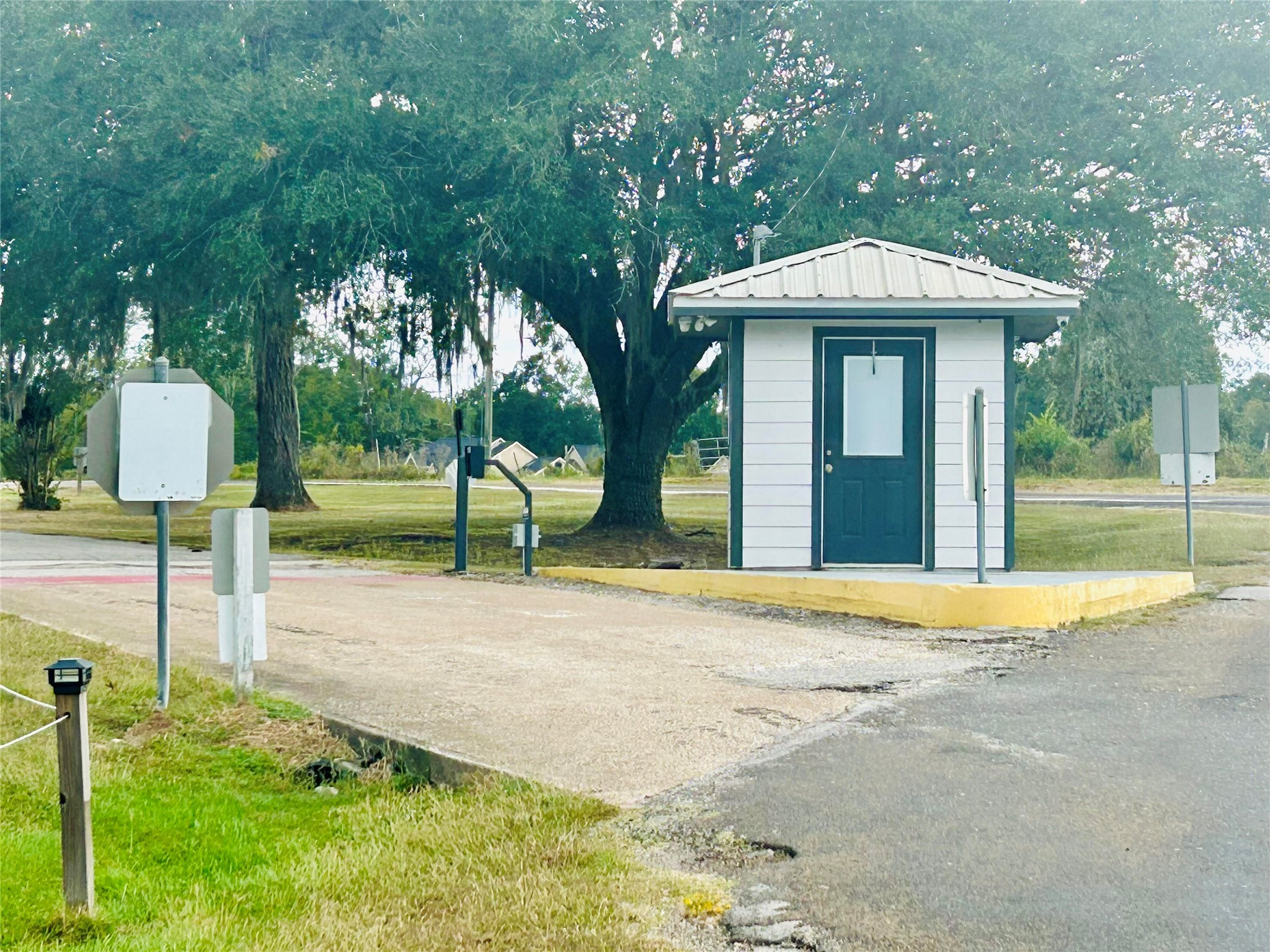 01 Hot Springs Drive Trinity, TX 75862 - Photo 10 of 11 a front view of a house with a yard and trees