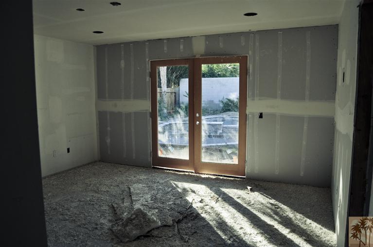 72955 Somera Road Palm Desert, CA 92260 - Photo 3 of 16 a view of an empty room with windows