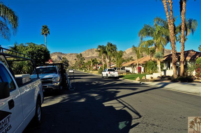 72955 Somera Road Palm Desert, CA 92260 - Photo 9 of 16 a view of a street with some cars on the road