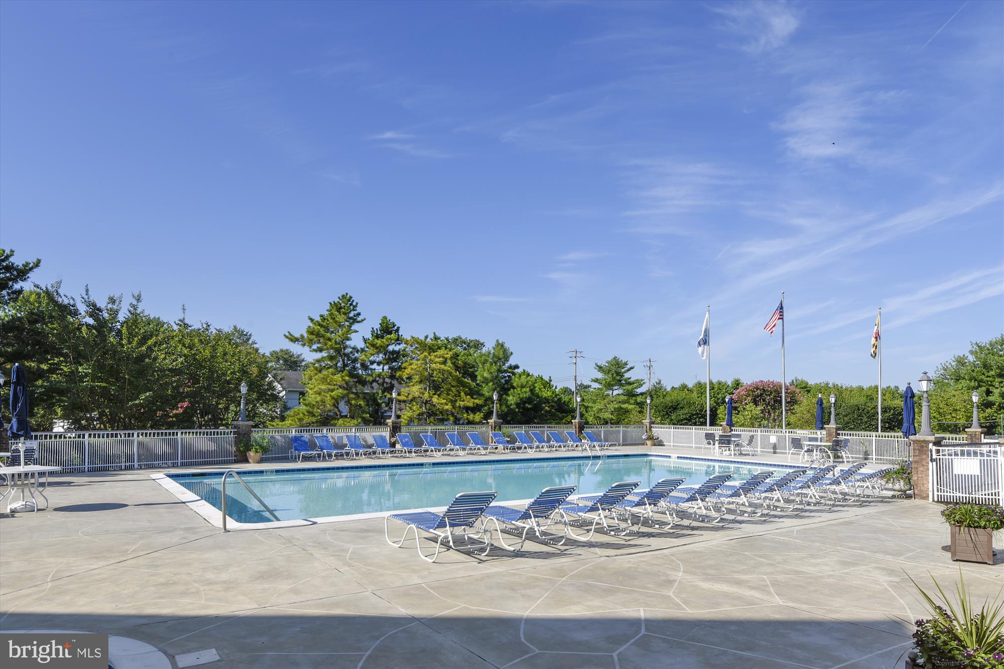 106 Bodys Neck Road Chester, MD 21619 - Photo 14 of 17 a view of a swimming pool and a yard