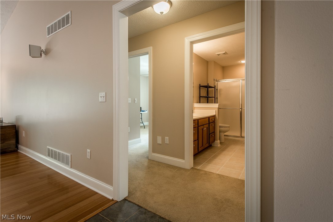5382 Grove Road Clinton, OH 44216 - Photo 22 of 35 Three bedrooms are off of the living room
